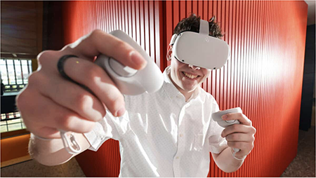 Image of man wearing VR headset 